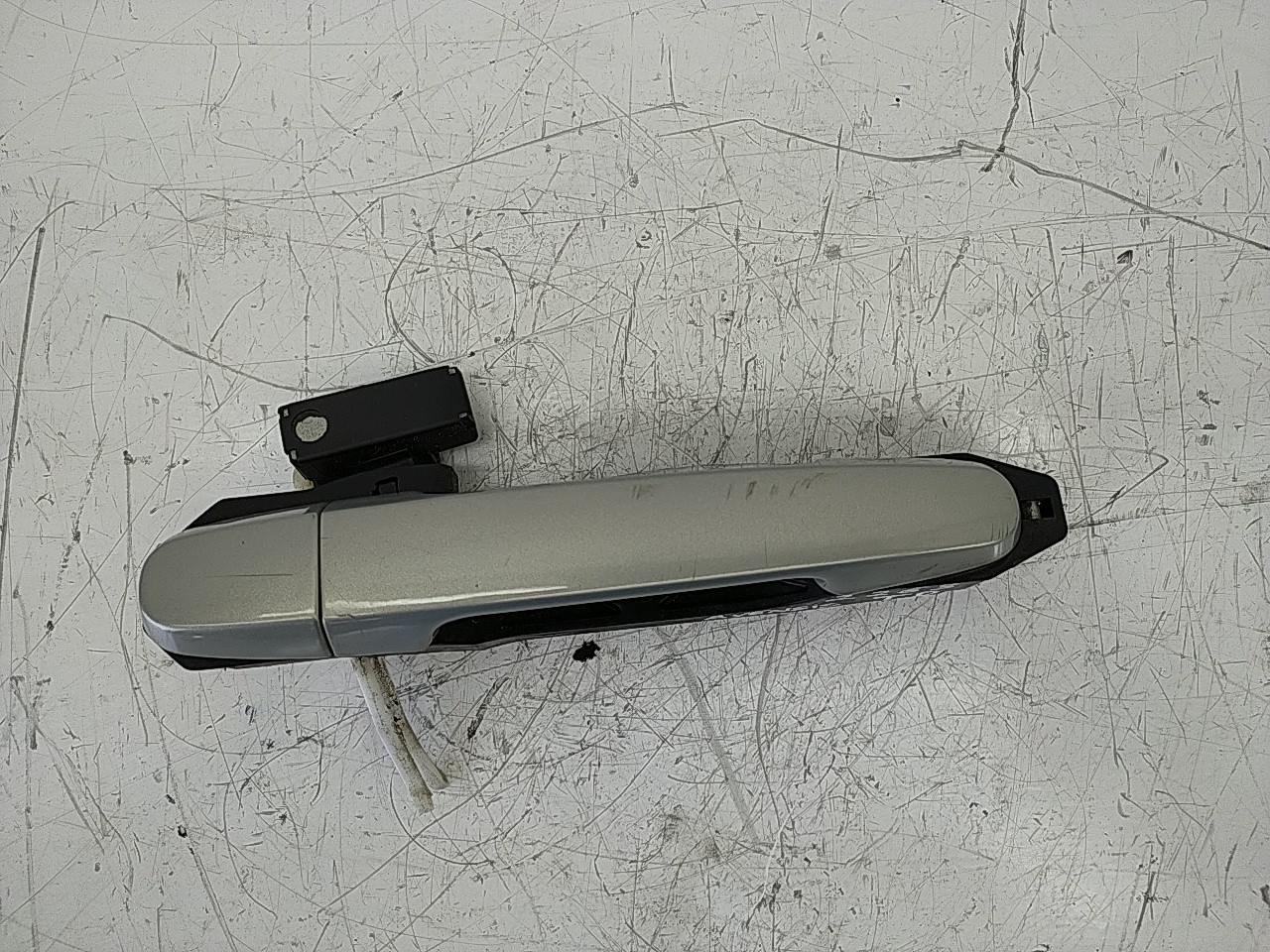 Puxador tras direito (20256911).