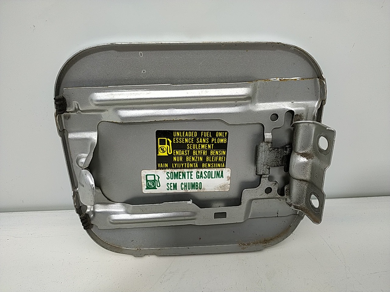 Porta de combustivel (20223033).