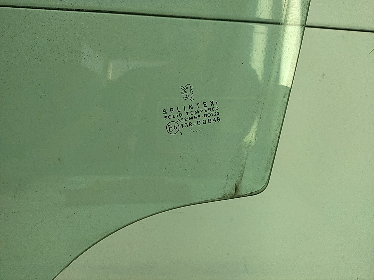 Vidro porta frente esquerda (20213780).