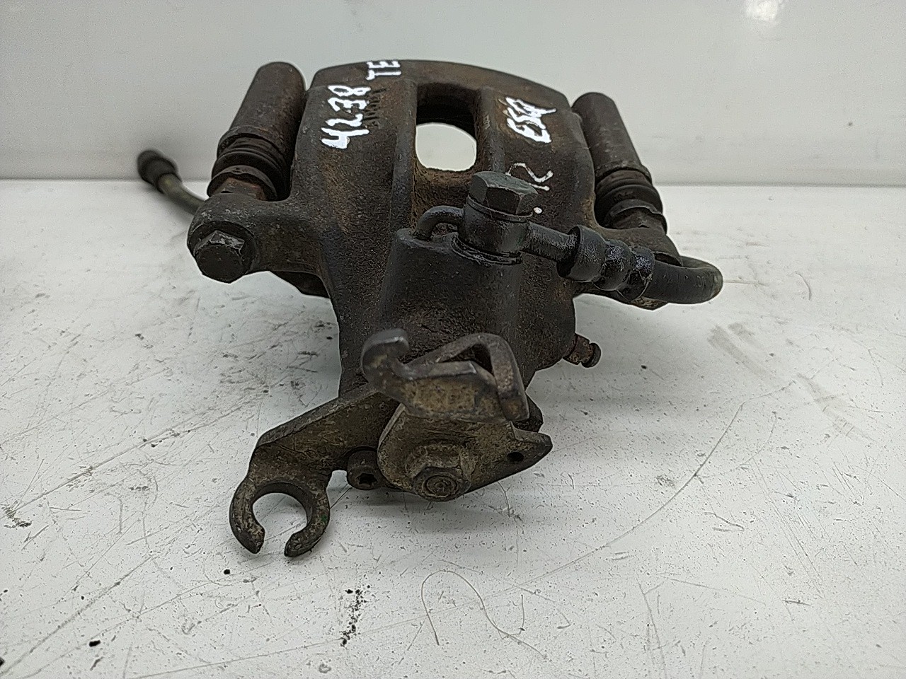 Pinça tras esquerda