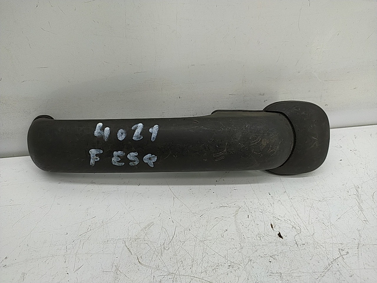 Puxador frente esquerdo (20272287).