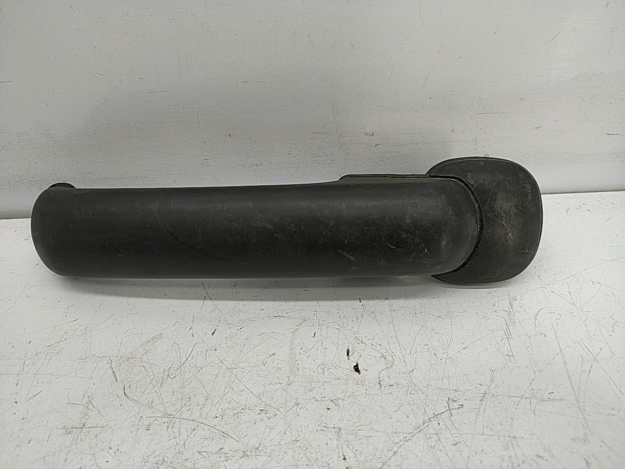 Puxador frente direito (111940).