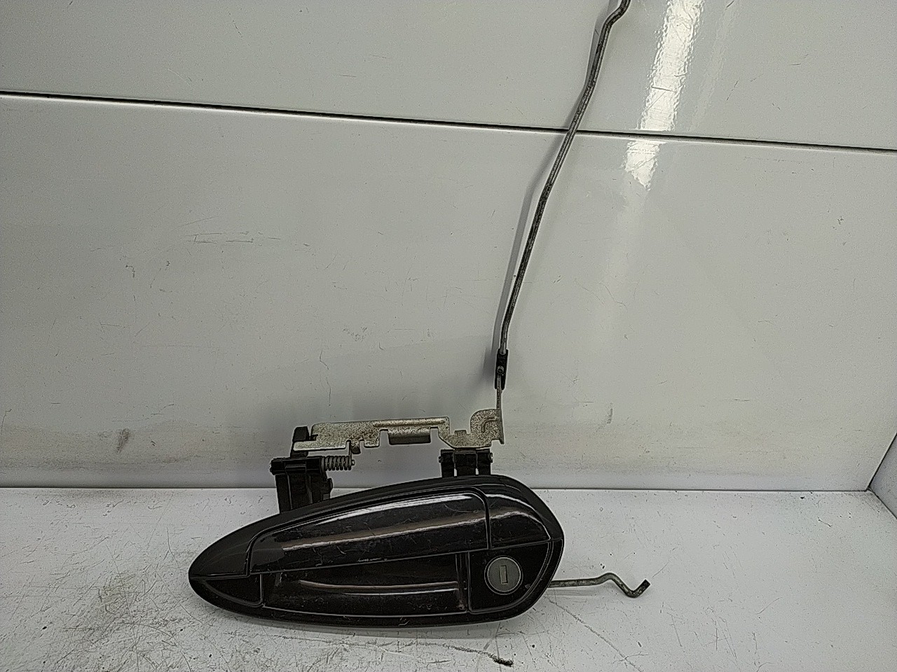 Puxador frente esquerdo (20249064).