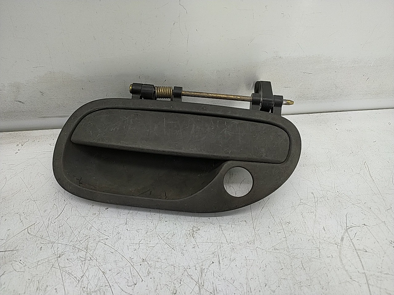 Puxador frente esquerdo