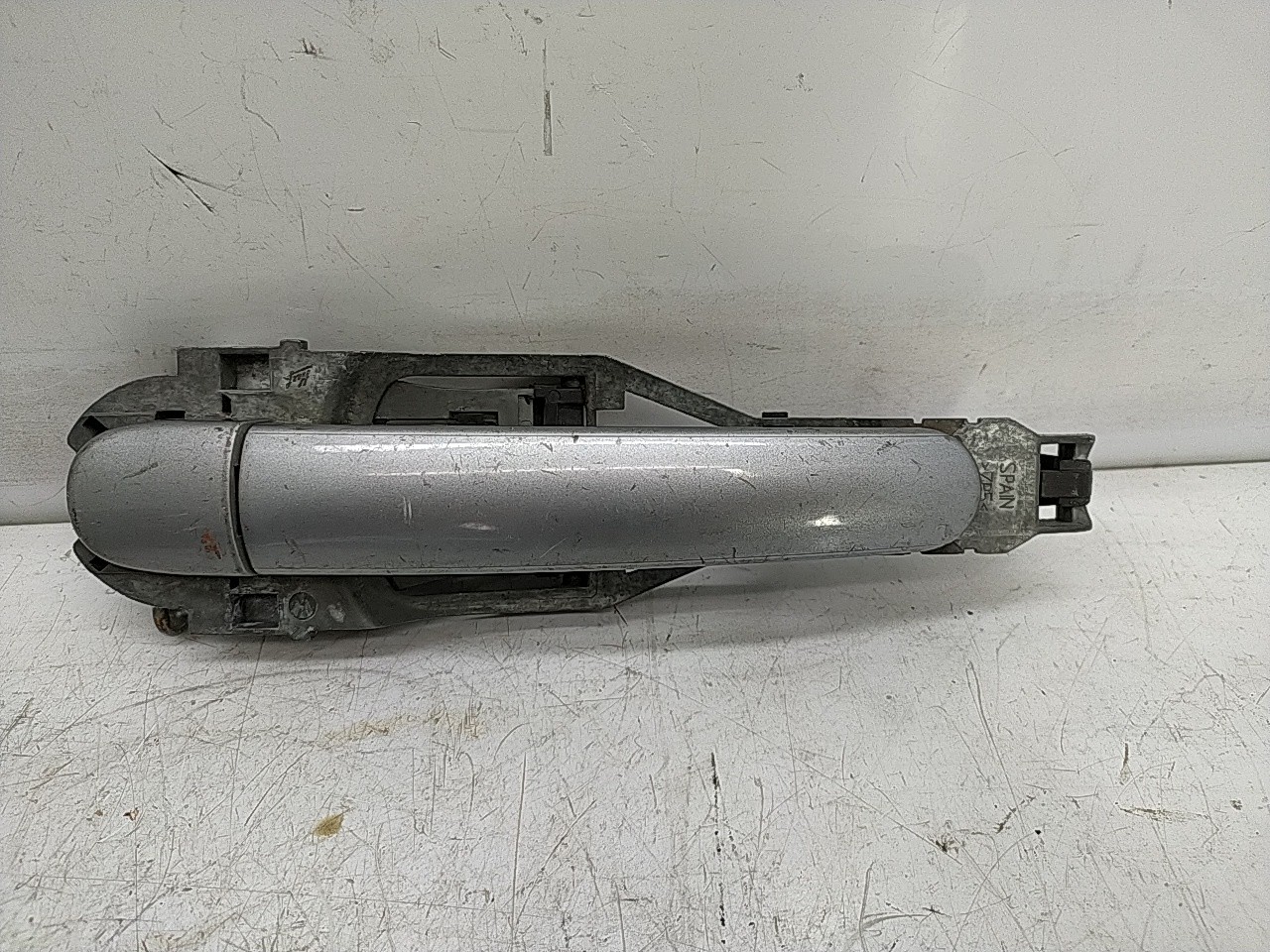 Puxador tras esquerdo