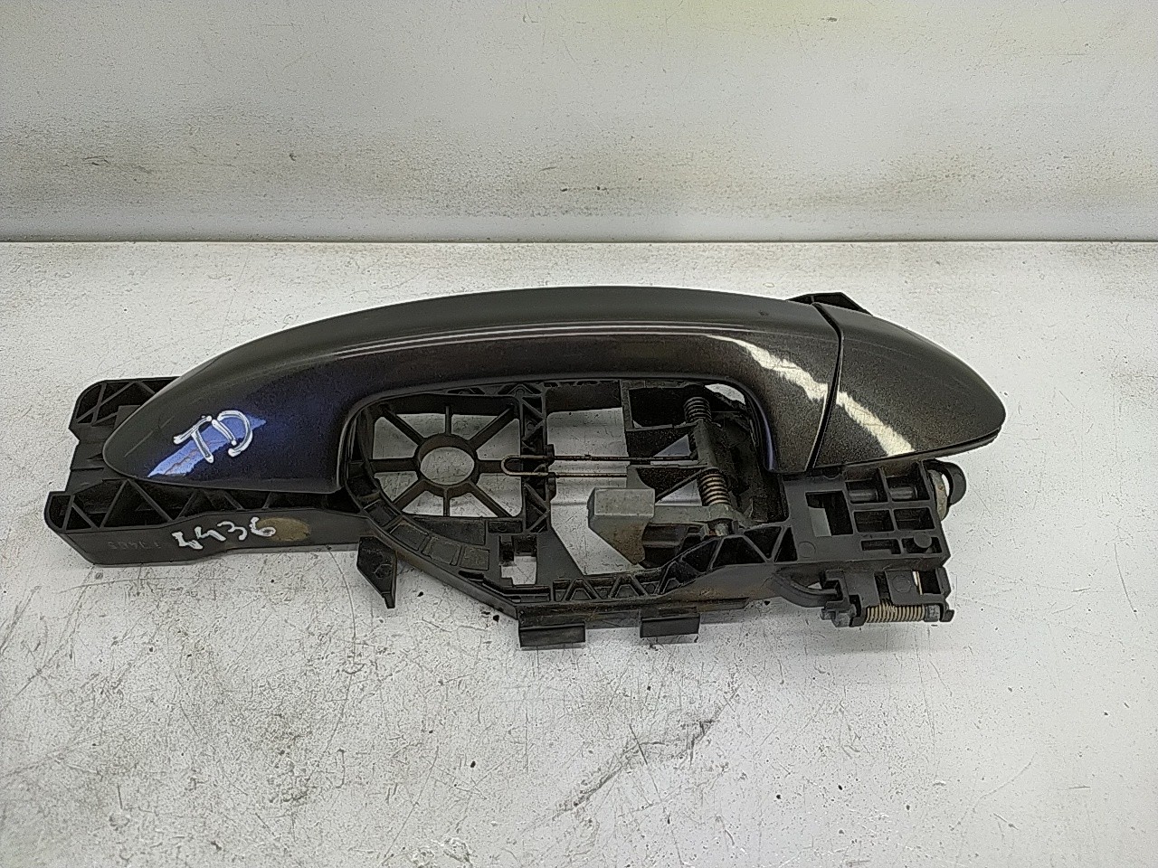 Puxador tras direito (20275244).