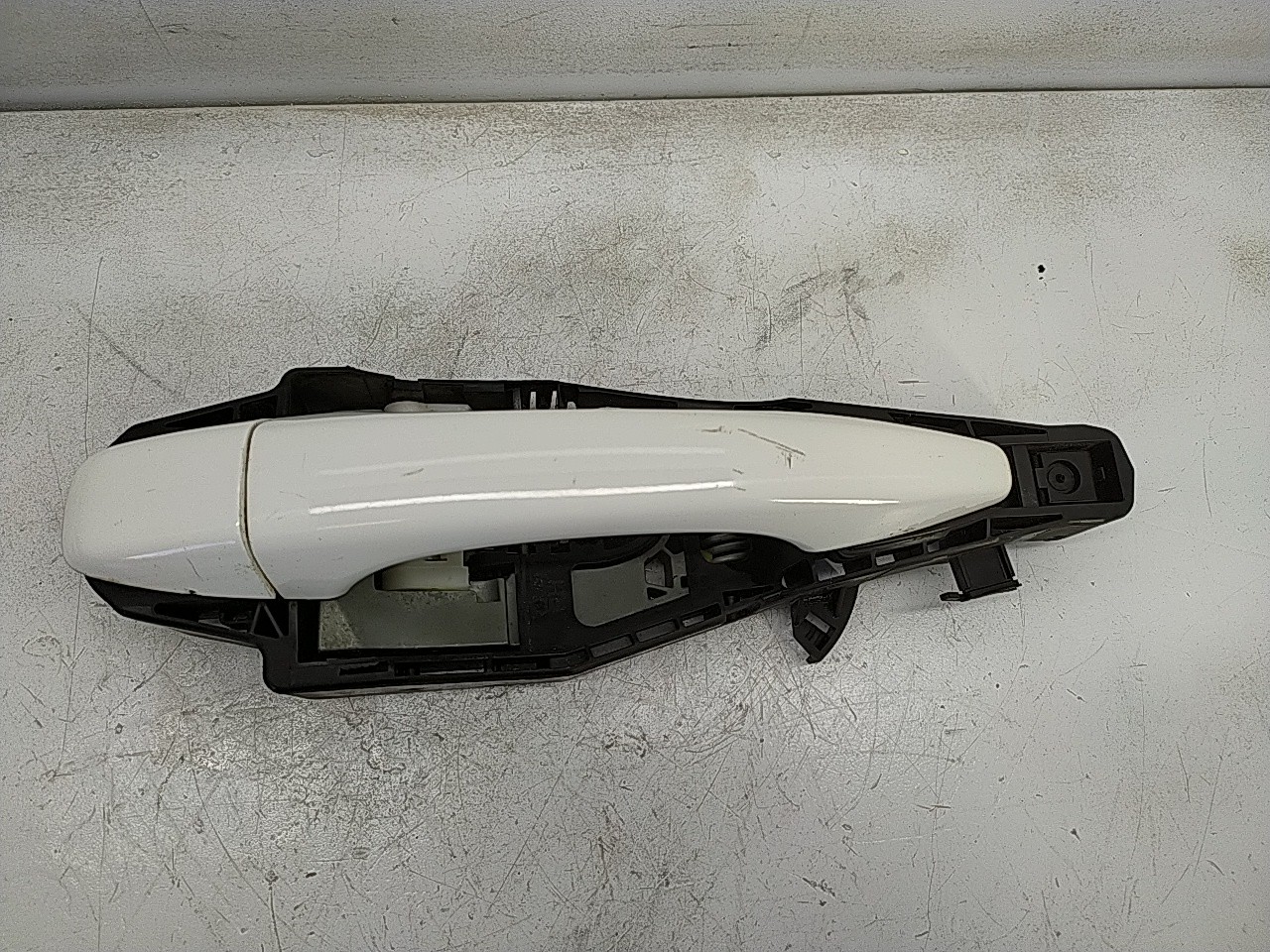 Puxador tras esquerdo (20276079).