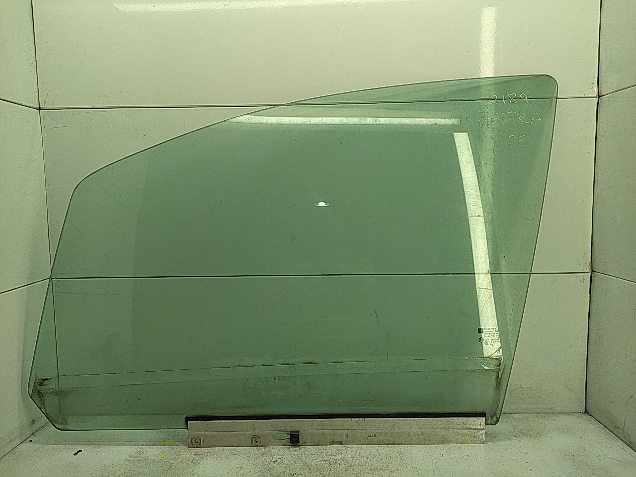 Vidro porta frente esquerda (20205990).