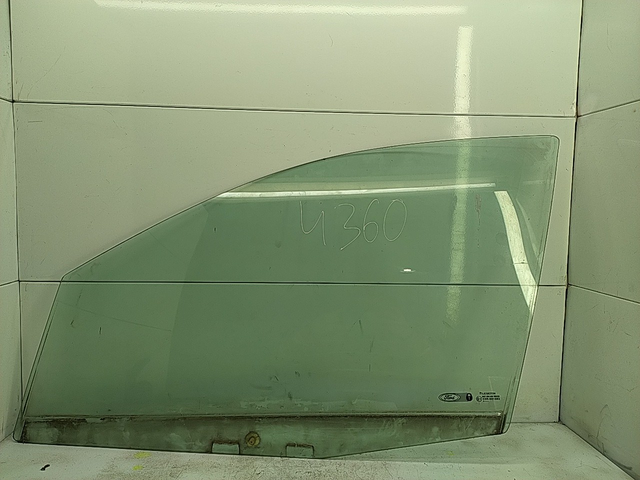 Vidro porta frente esquerda (20235200).