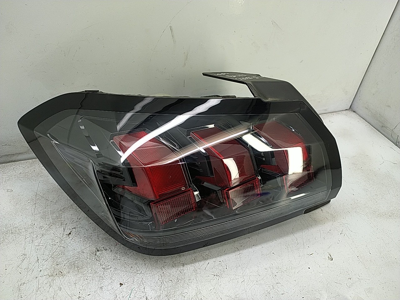 Farolim tras esquerdo painel stop (20277357).