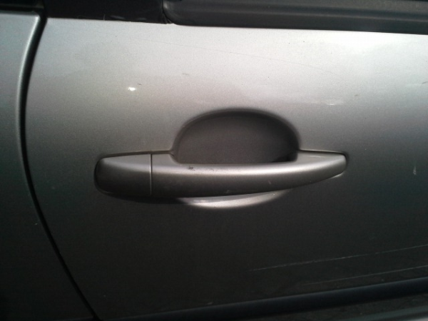 Puxador frente direito (20211399).