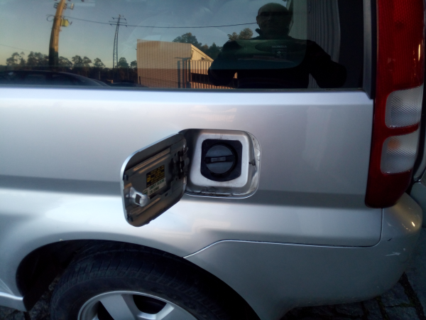 Porta de combustivel (20223033).