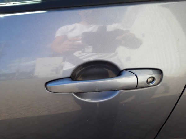 Puxador frente esquerdo (20232279).