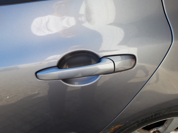 Puxador tras esquerdo