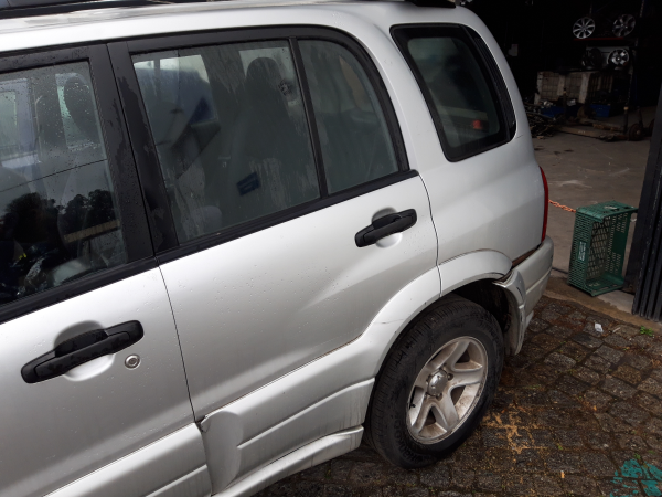 Porta tras esquerda (20232530).