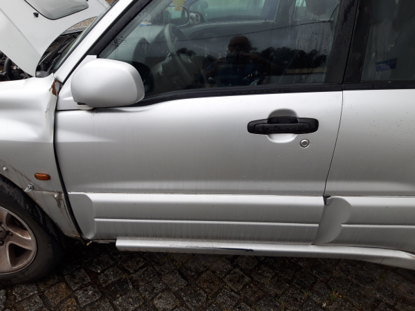 Puxador frente esquerdo (20232538).