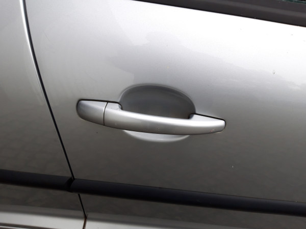 Puxador frente direito (20233622).