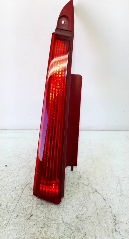 Farolim tras esquerdo painel stop (20234679).