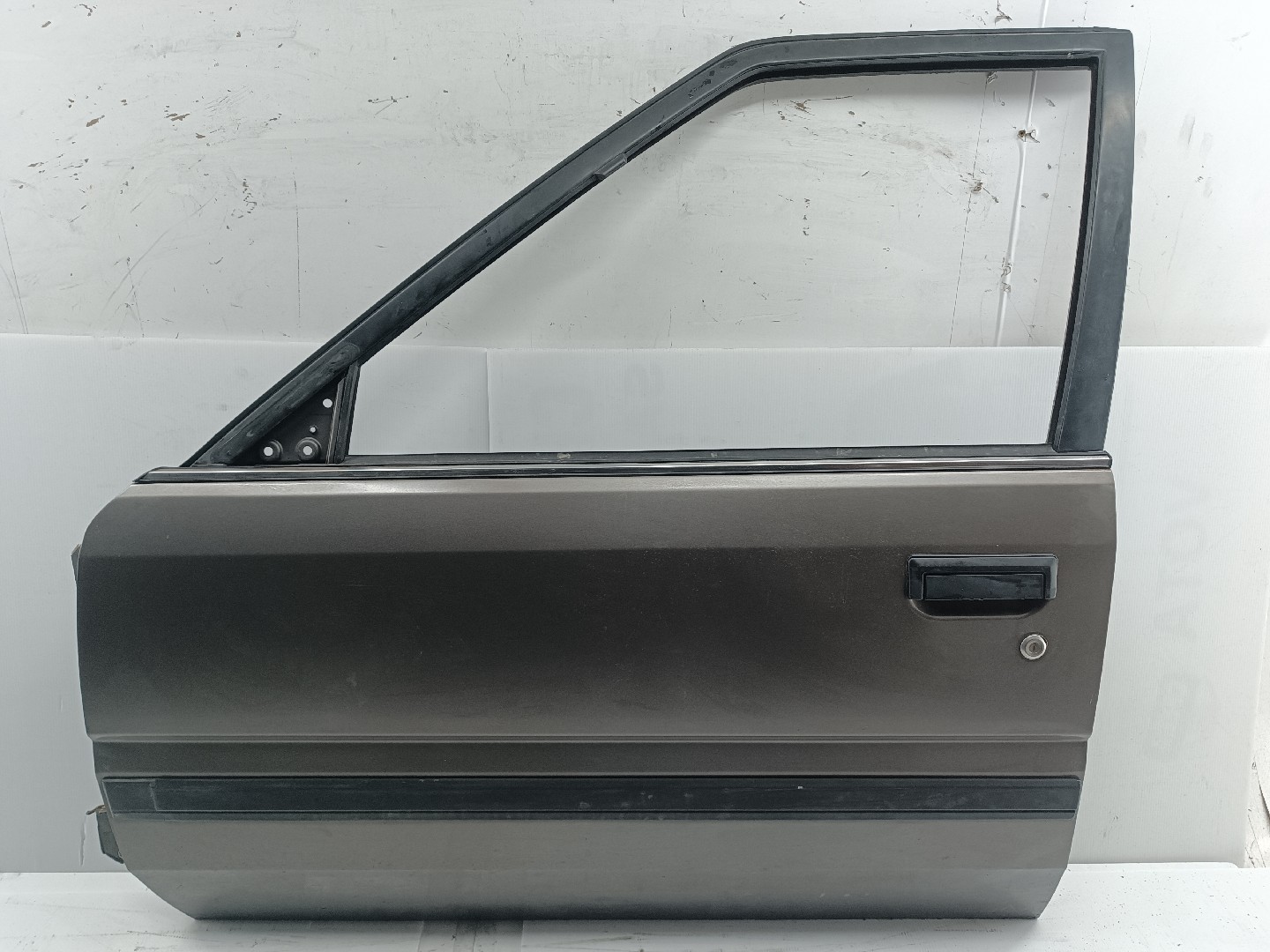 Porta Frente Esquerda NISSAN BLUEBIRD (T72 , T12, U12) | 85 - 90