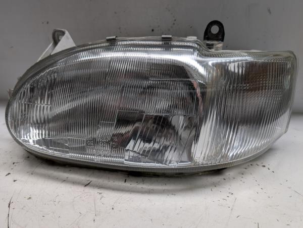 Left Headlight FORD ESCORT V Turnier (ANL) | 90 - 95