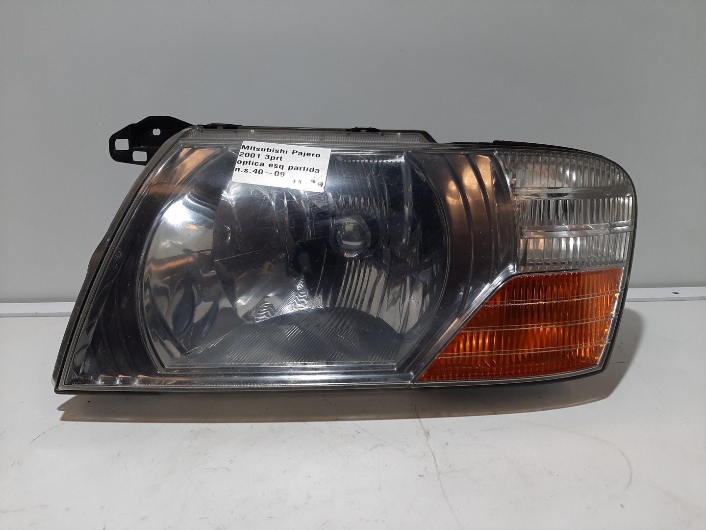 Farol Esq MITSUBISHI PAJERO III (V7_W, V6_W) | 99 - 07