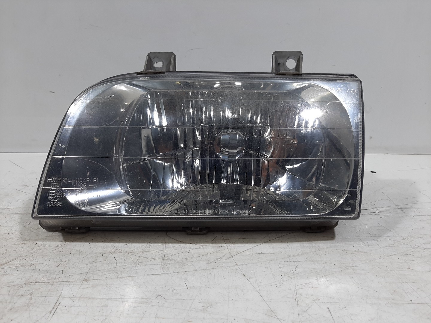 Farol Esq KIA SPORTAGE (K00) | 94 - 05
