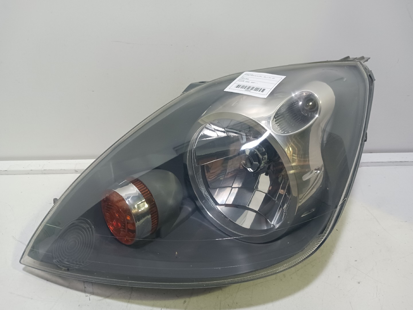 Farol Esq FORD FIESTA V (JH_, JD_) | 01 - 14