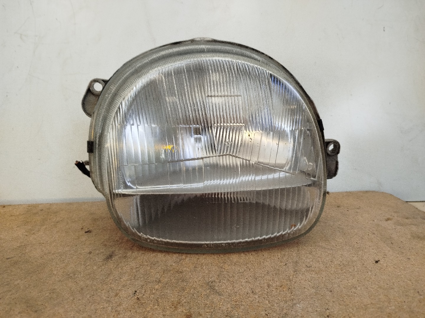 Farol/ Otica Dianteiro ESQ RENAULT TWINGO I  de 1993 a 2012