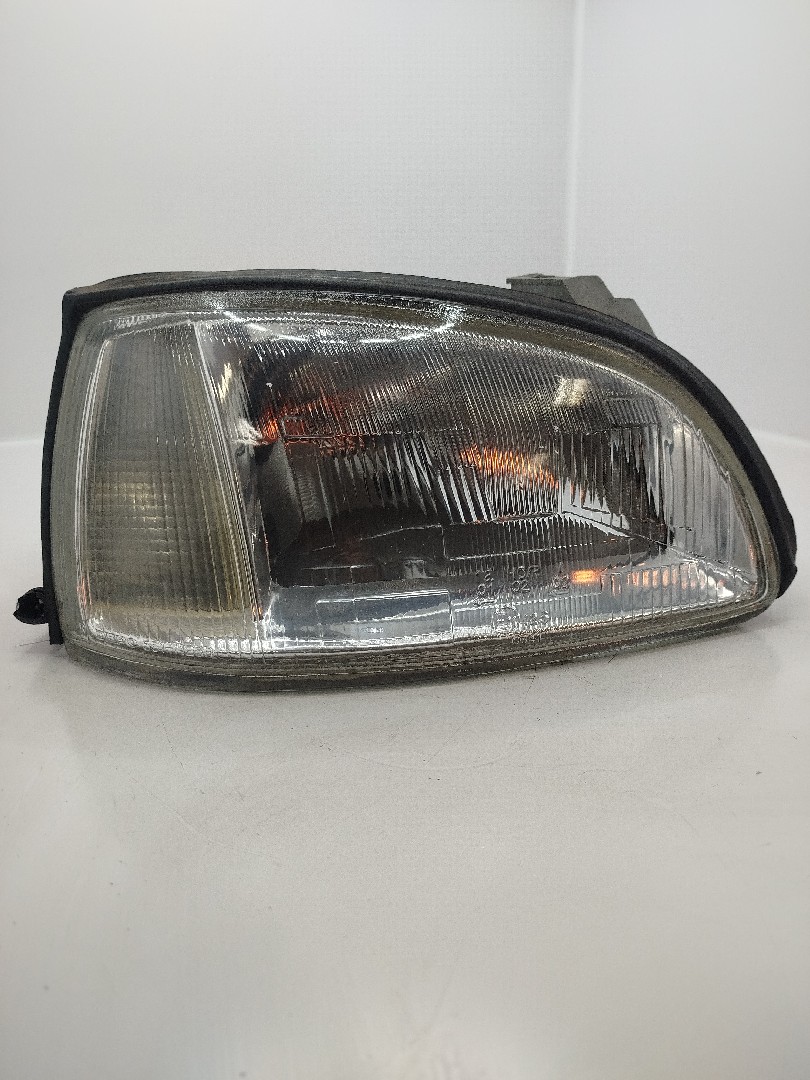 Farol/ Otica Dianteiro DTO RENAULT CLIO I  de 1990 a 1998