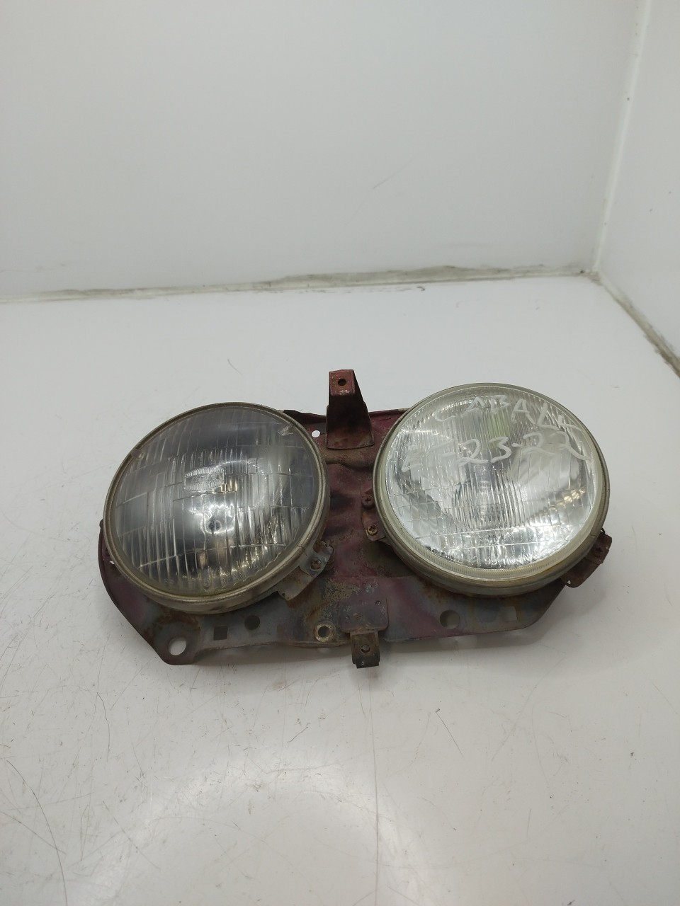 Farol/ Otica Dianteiro ESQ NISSAN CABSTAR  de 1981 a 1992