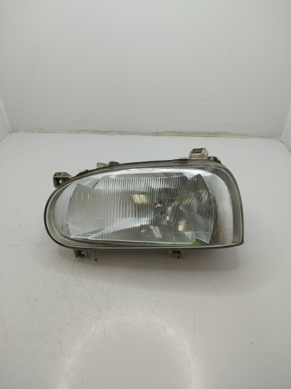 Farol/ Otica Dianteiro ESQ VOLKSWAGEN GOLF III  de 1991 a 1998
