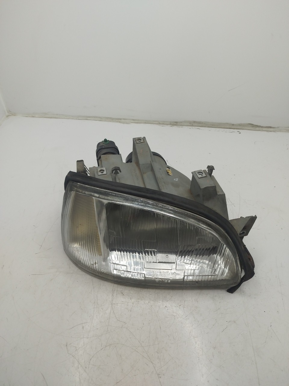 Farol/ Otica Dianteiro DTO RENAULT CLIO I  de 1990 a 1998