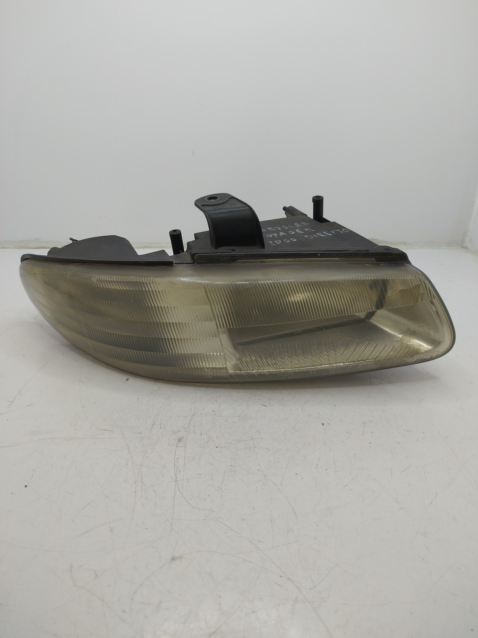 Farol/ Otica Dianteiro DTO CHRYSLER VOYAGER / GRAND VOYAGER III  de 1995 a 2001