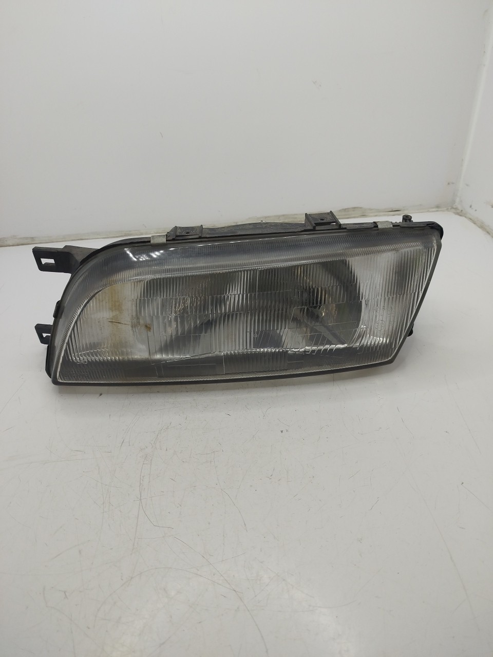 Farol/ Otica Dianteiro ESQ NISSAN ALMERA I Hatchback  de 1995 a 2001