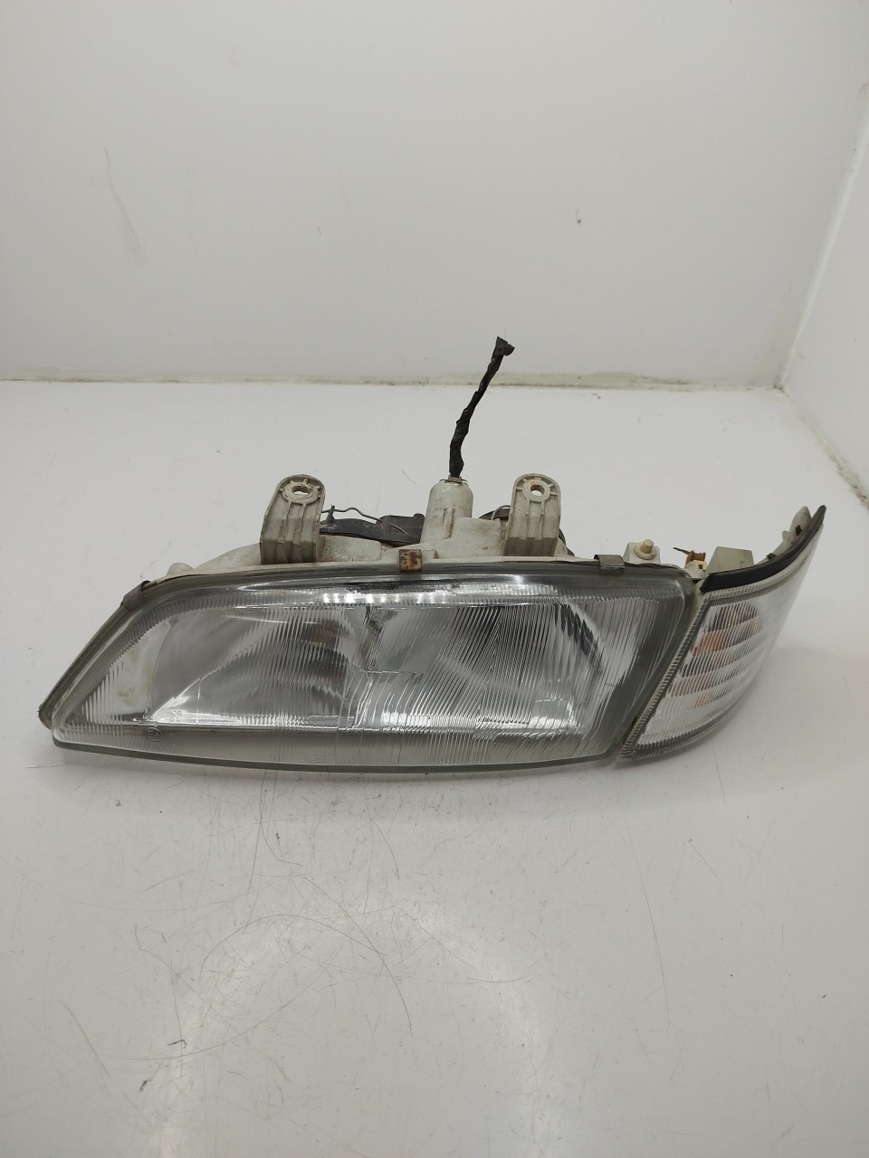 Farol/ Otica Dianteiro ESQ NISSAN PRIMERA  de 1996 a 2001