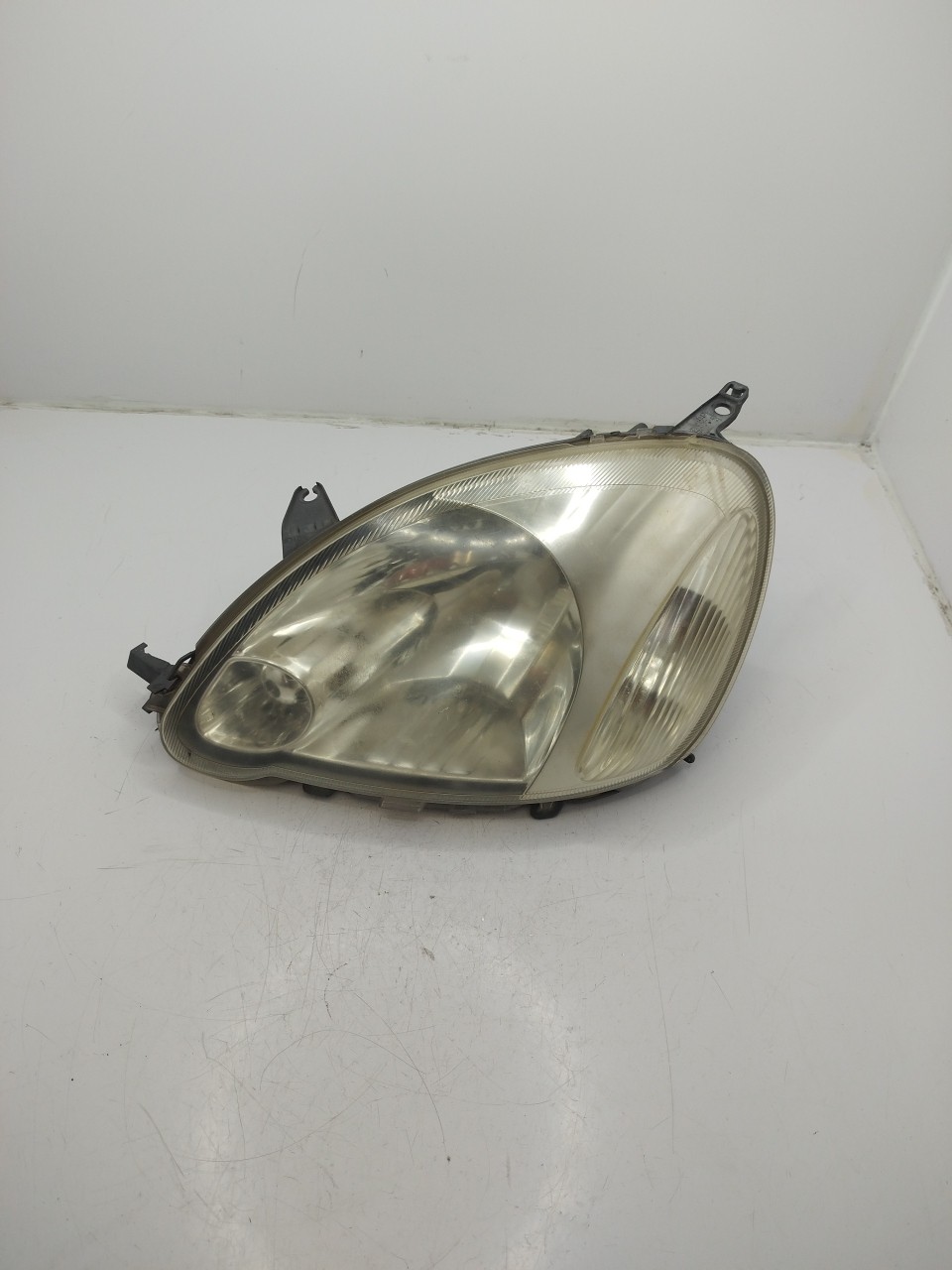 Farol/ Otica Dianteiro ESQ TOYOTA YARIS  de 1999 a 2005