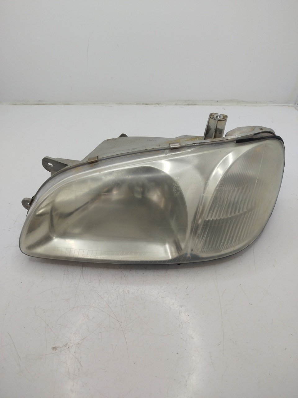 Farol/ Otica Dianteiro ESQ KIA CARNIVAL II  de 1999 a 2007
