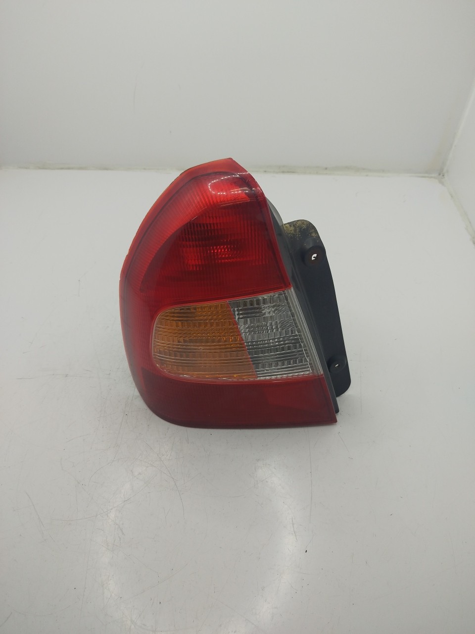 Farolim Stop Esq HYUNDAI ACCENT II  de 1999 a 2006