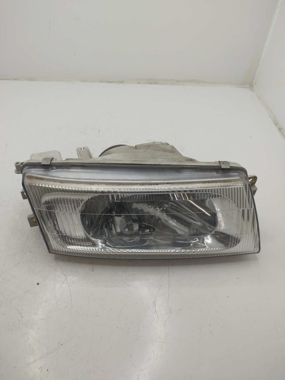 Farol/ Otica Dianteiro DTO MITSUBISHI LANCER VI  de 1995 a 2003