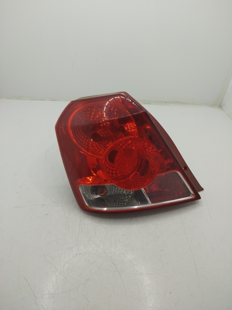 Farolim Stop Esq CHEVROLET AVEO / KALOS Hatchback  de 2003 a 2008