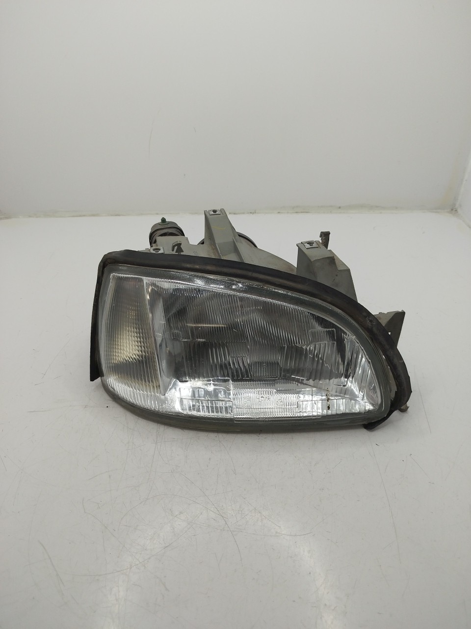 Farol/ Otica Dianteiro DTO RENAULT CLIO I  de 1990 a 1998