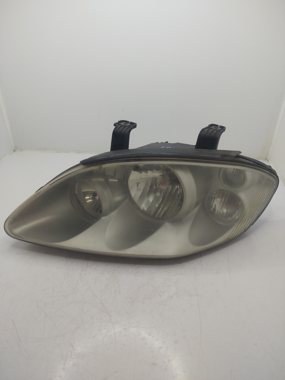 Farol/ Otica Dianteiro ESQ SSANGYONG RODIUS  de 2005 a 0