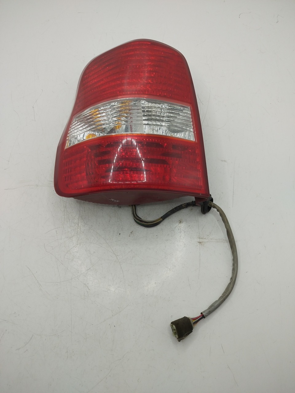 Farolim Stop Esq KIA CARNIVAL II  de 1999 a 2007