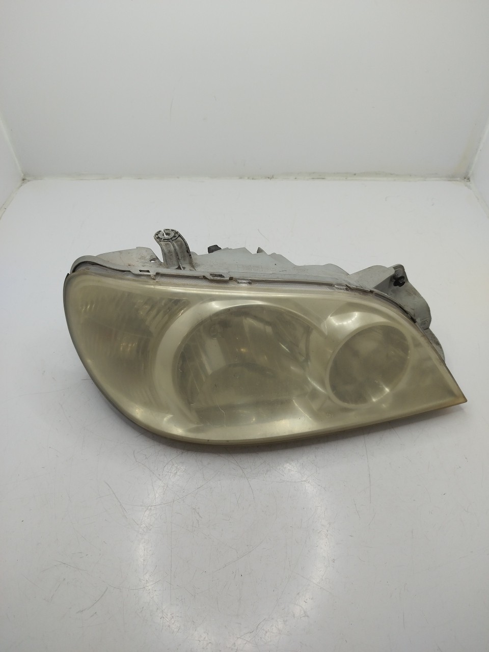 Farol/ Otica Dianteiro DTO KIA CARNIVAL II  de 1999 a 2007