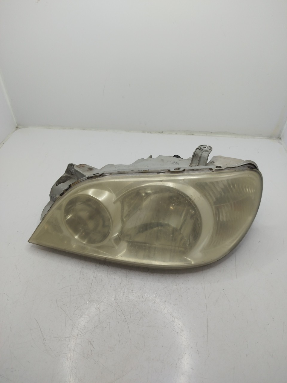 Farol/ Otica Dianteiro ESQ KIA CARNIVAL II  de 1999 a 2007