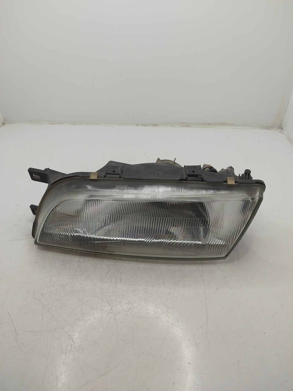 Farol/ Otica Dianteiro ESQ NISSAN ALMERA I Hatchback  de 1995 a 2001