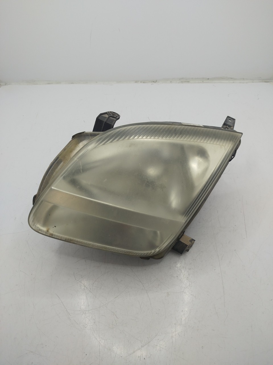 Farol/ Otica Dianteiro ESQ SUZUKI IGNIS II  de 2003 a 0