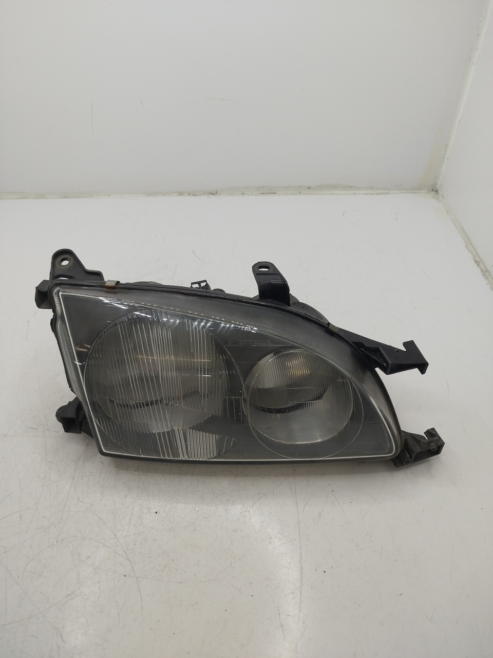Farol/ Otica Dianteiro DTO TOYOTA AVENSIS  de 1997 a 2003