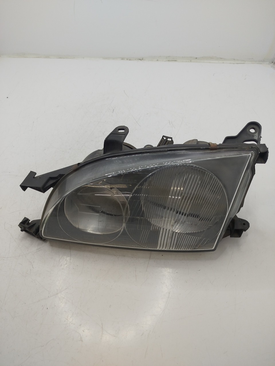 Farol/ Otica Dianteiro ESQ TOYOTA AVENSIS  de 1997 a 2003