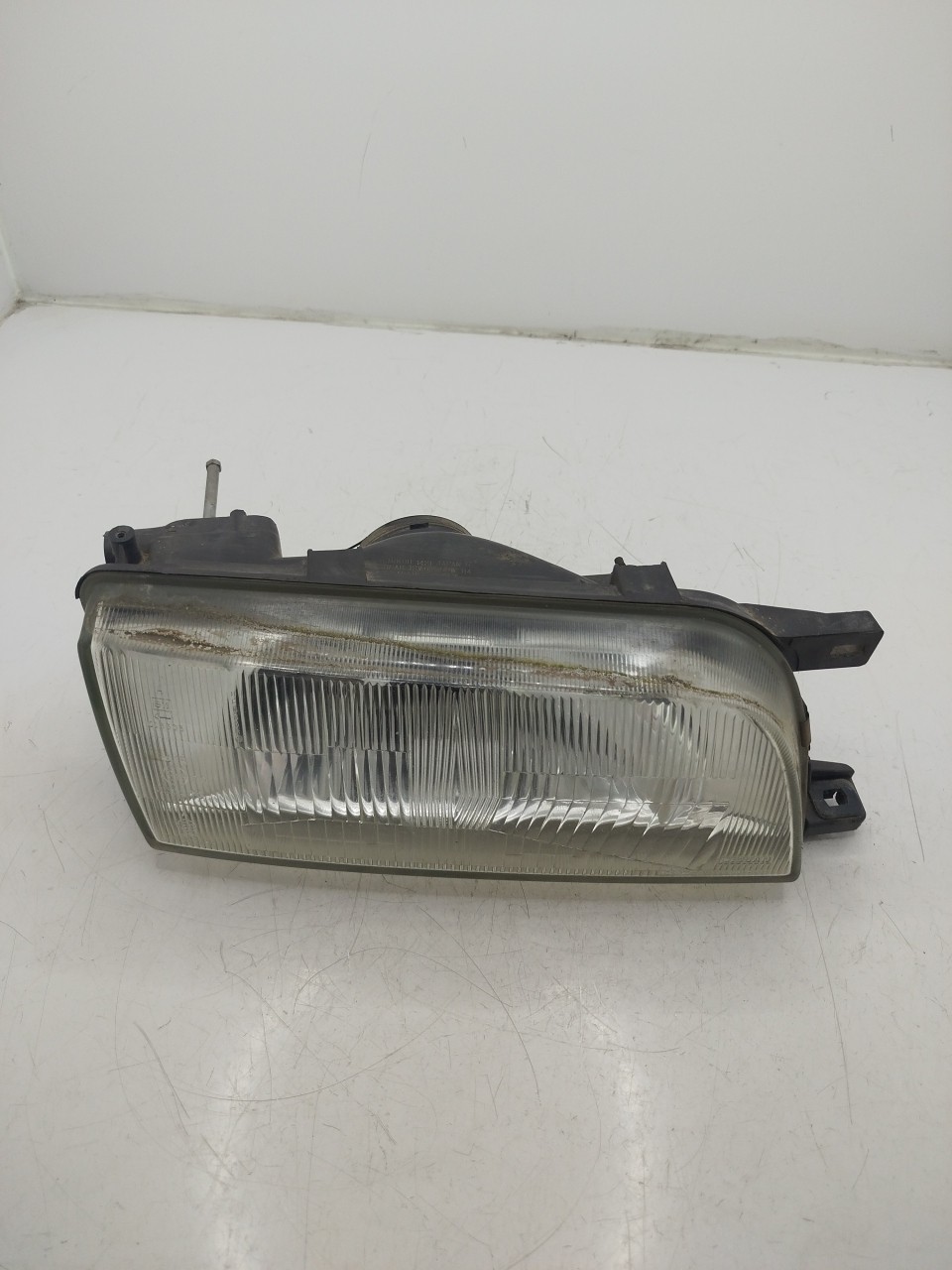 Farol/ Otica Dianteiro DTO NISSAN SUNNY III Liftback  de 1990 a 1995